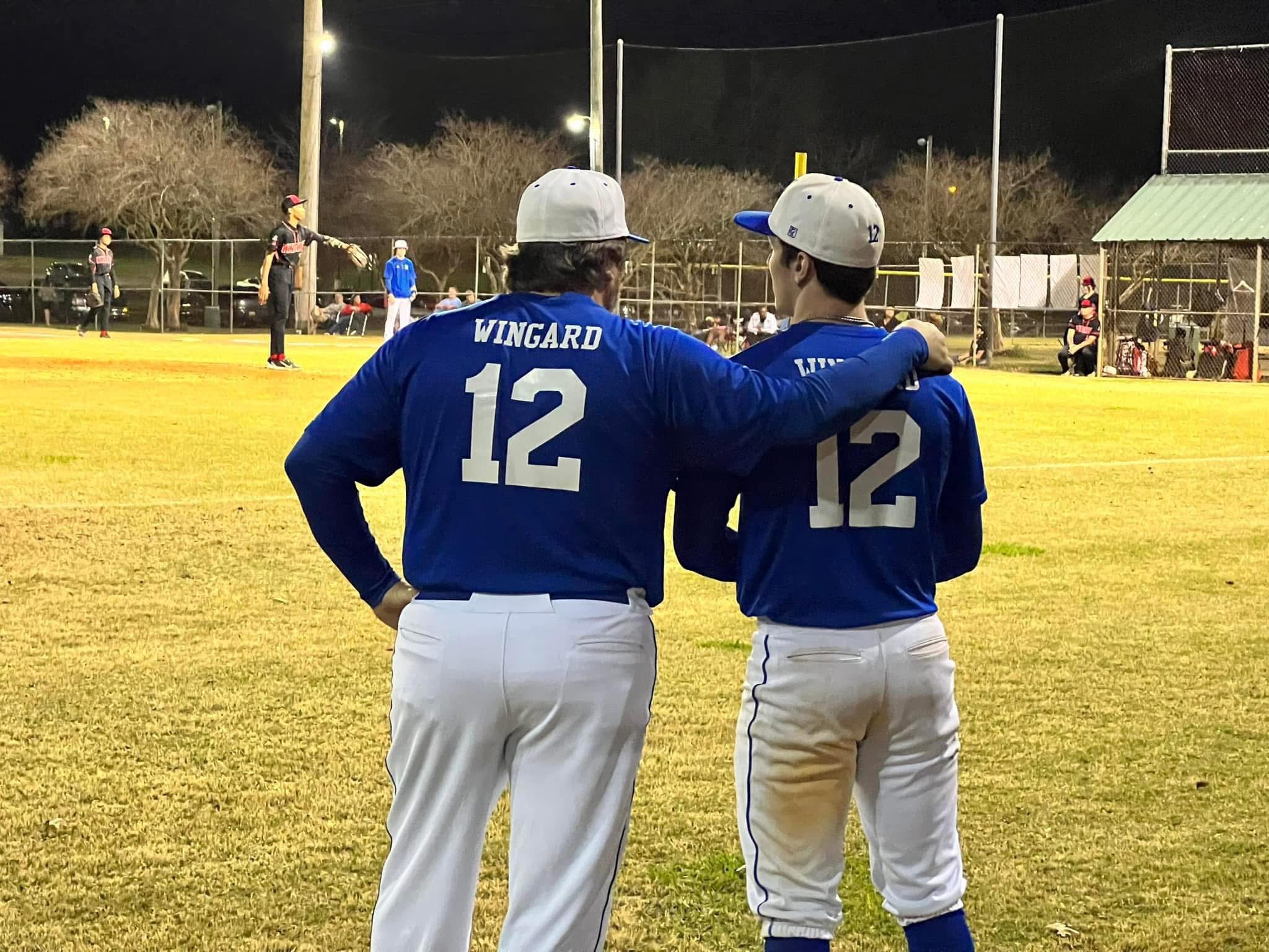 Coach Clay and Wade sharing number 12