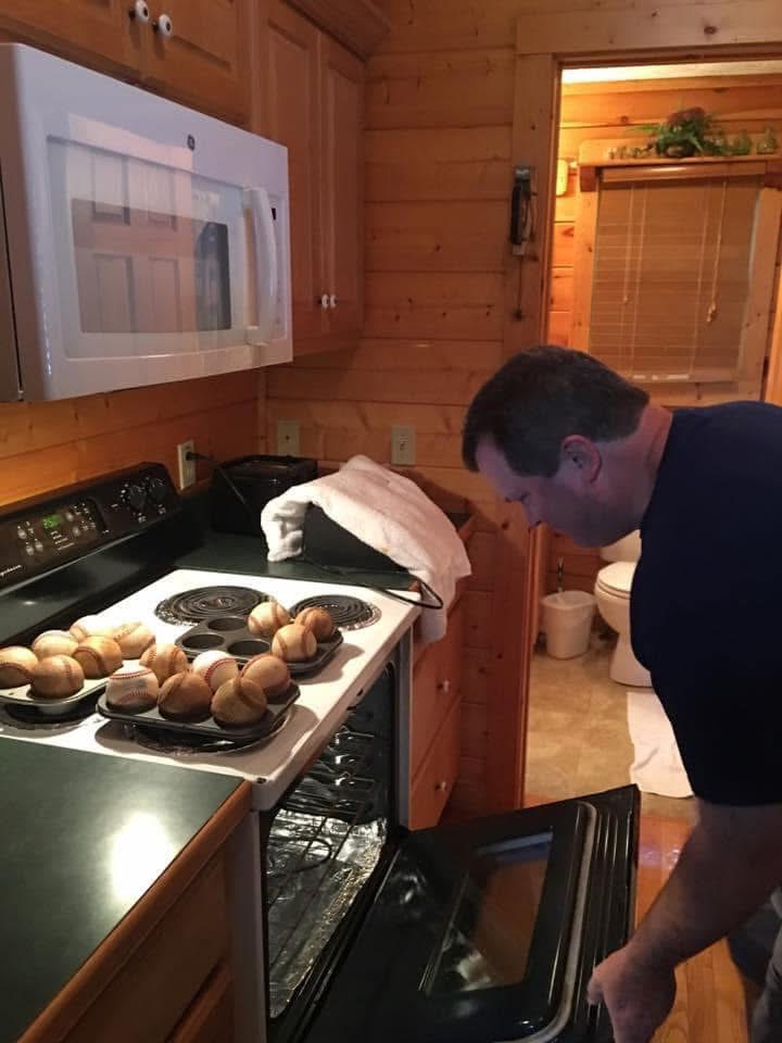 Coach Clay drying baseballs while on vacation after NACA