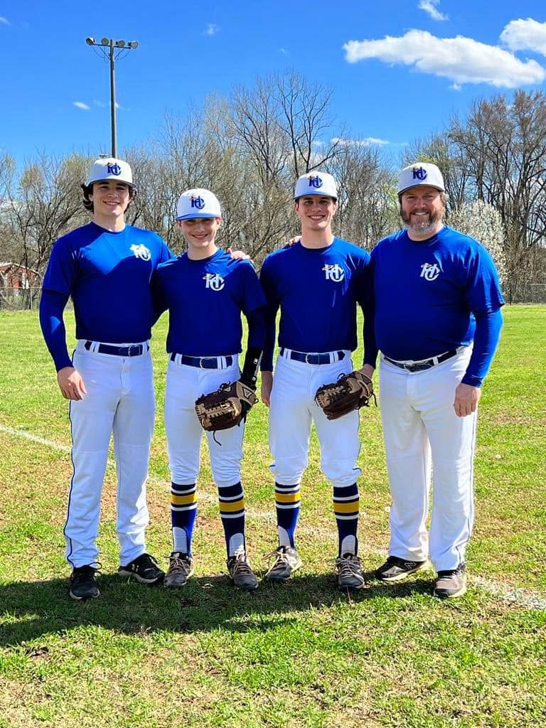 Coach Clay with three of his sons during his final season